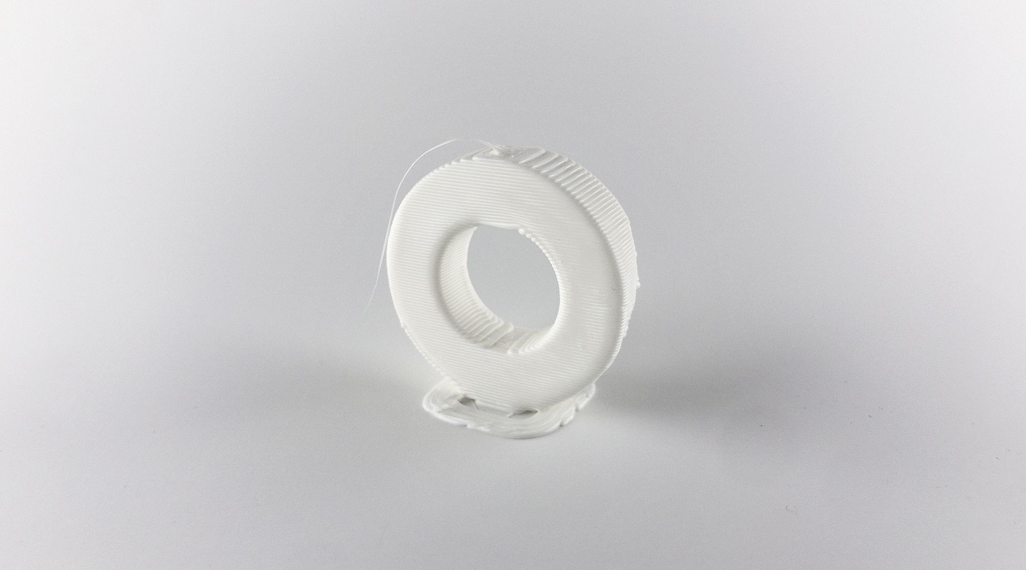 3D printed 'O' demonstrating the flat line at the top of the hole